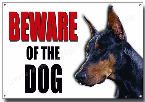 Doberman beware the dog - of,